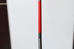 Spade with rubber covered shaft