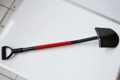 Spade with rubber covered shaft